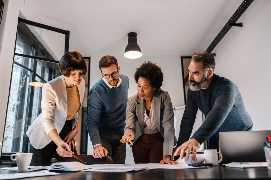 Team of innovators at Malaysian Business Machines